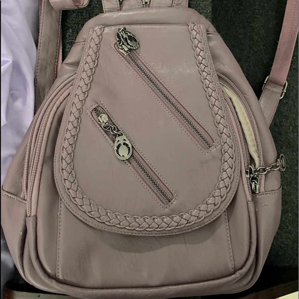 Hand crafted leather backpack purse